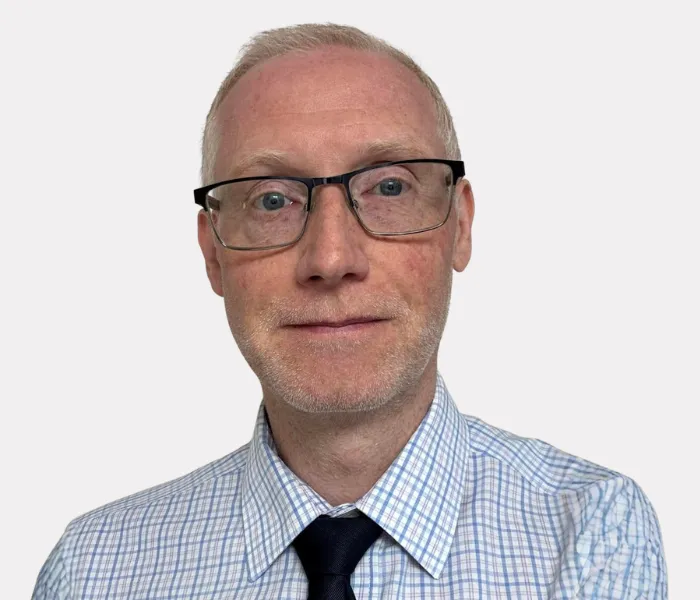 a headshot of Richard